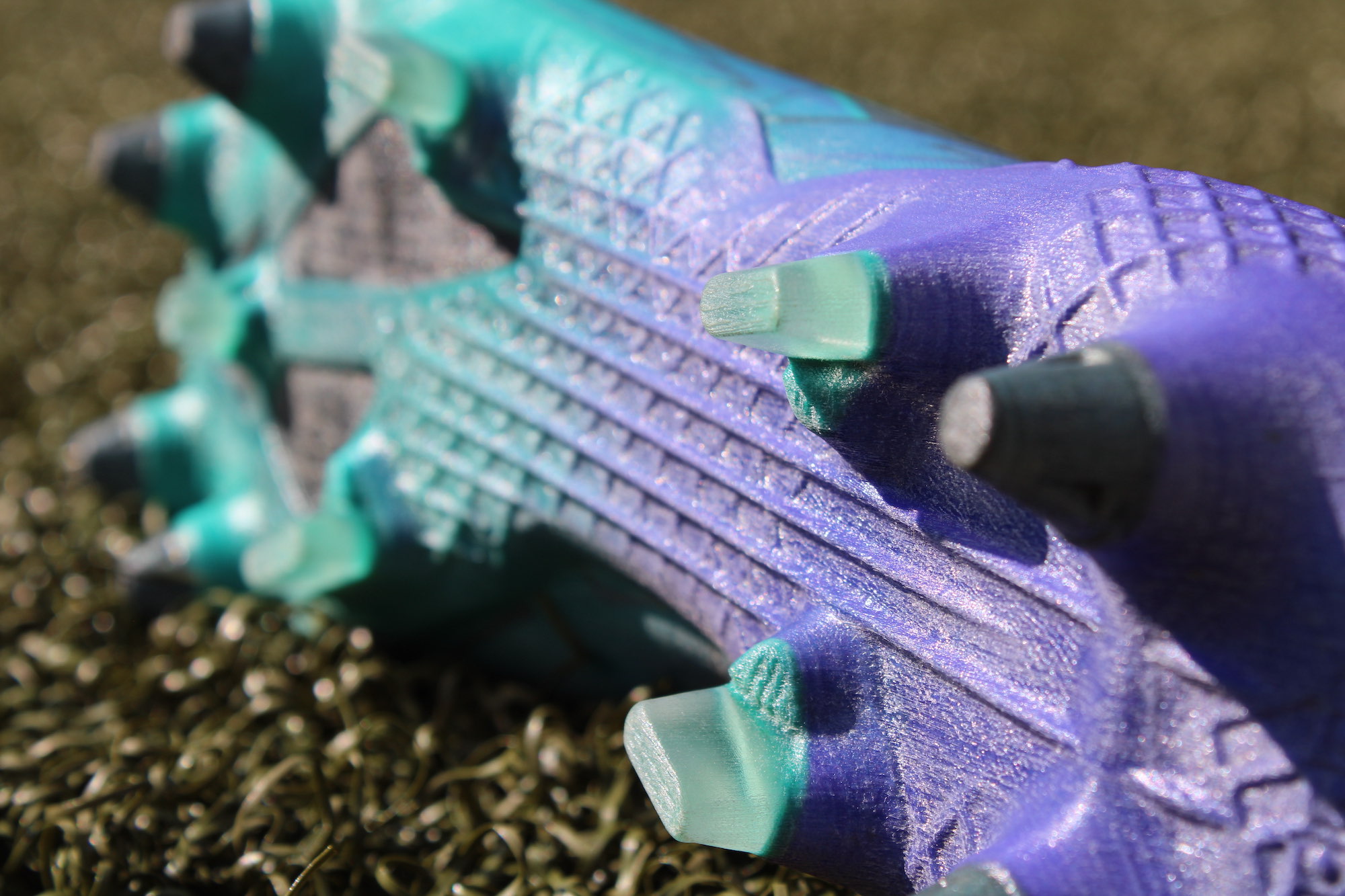 A realistic looking 3D printed football shoe